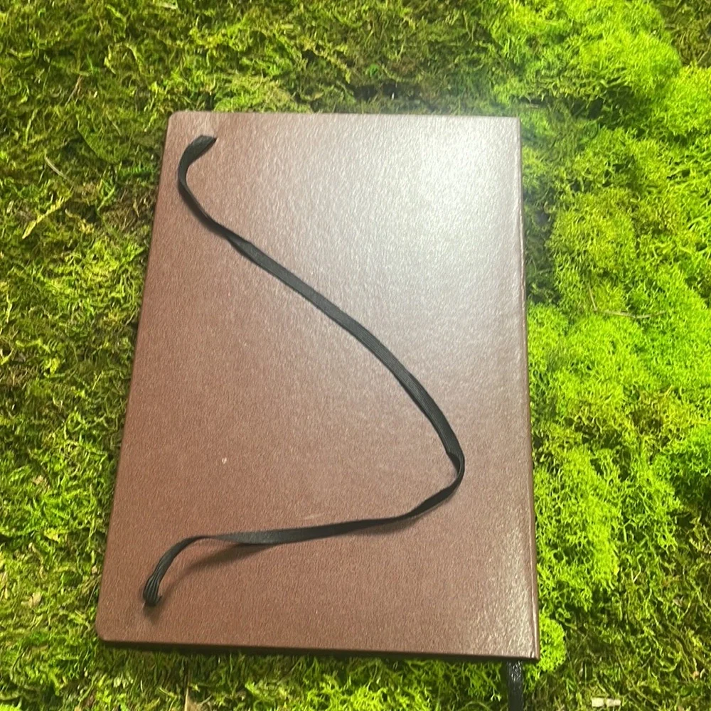 New-ish   La Madison Cointreau.  Notebook